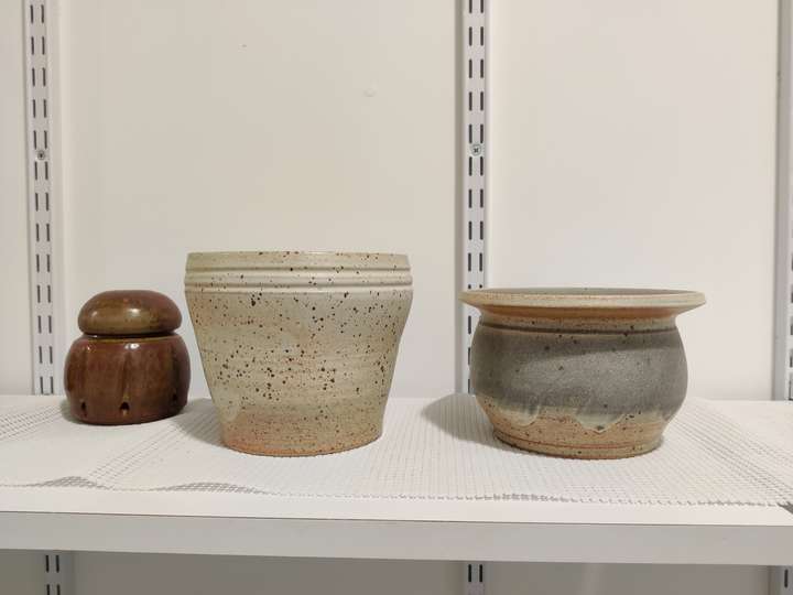 Planters and lidded garlic jar